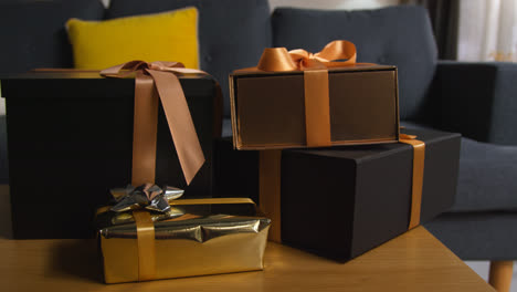 Close-Up-Of-Gift-Wrapped-Presents-On-Table-In-Lounge-At-Home-2